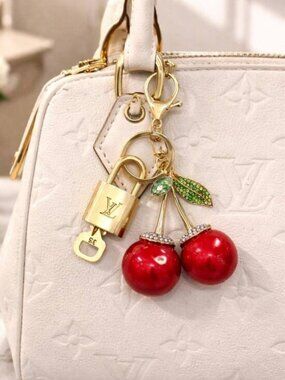 Authentic Louis Vuitton Gold Lock & Key 🔑 Bag Charm w/ Unbranded Cherry Charm
